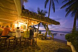 Philippines - Atlantis Puerto Galera Dive Resort. 50 bar at sunset.